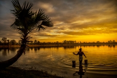 Fetching Water At Sunrise