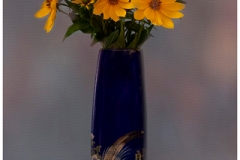Yellow Flowers And Blue Vase